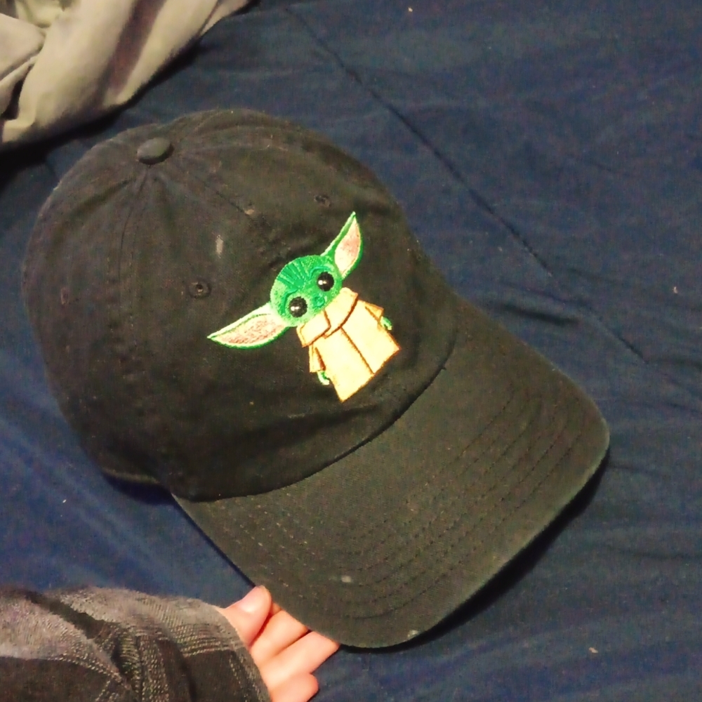 A Hat,It has baby Yoda on it, it's been worn 1 time.